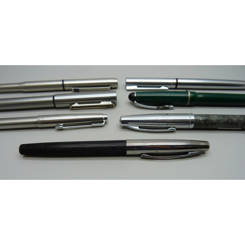 877 - Six fountain pens including and a ballpoint pen case