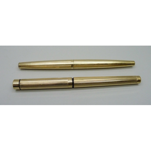 879 - Two gold electroplated Sheaffer fountain pens with 14ct nibs