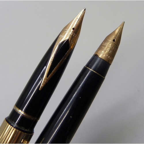 879 - Two gold electroplated Sheaffer fountain pens with 14ct nibs