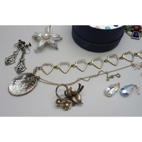 884 - Three silver brooches, costume jewellery, etc.