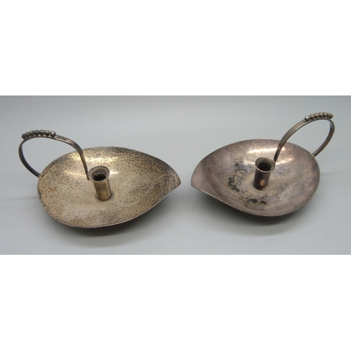 893 - A pair of silver candle holders, Birmingham 1961 and 1964, Albert Edward Jones, 112g