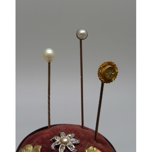 894 - Two yellow metal stick pins, a stick pin with a 15ct gold top, a/f, a single 9ct gold earring, a sil... 