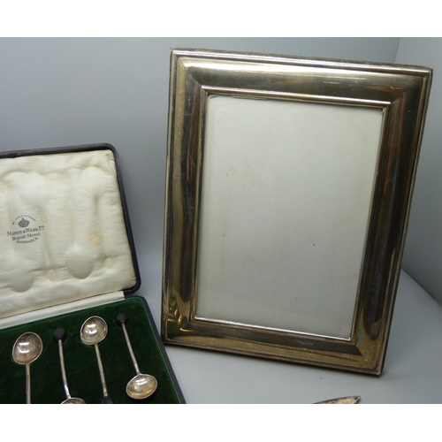 896 - A cased set of six silver Mappin & Webb coffee bean spoons, a silver photograph frame, 17.5 x 22.5cm... 