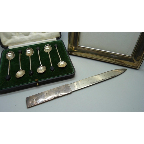 896 - A cased set of six silver Mappin & Webb coffee bean spoons, a silver photograph frame, 17.5 x 22.5cm... 