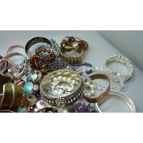 918 - A collection of costume bracelets and bangles