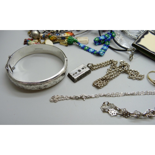 922 - A collection of costume jewellery including some silver