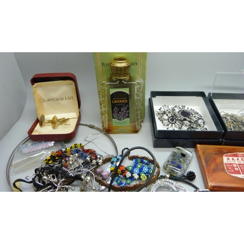 922 - A collection of costume jewellery including some silver