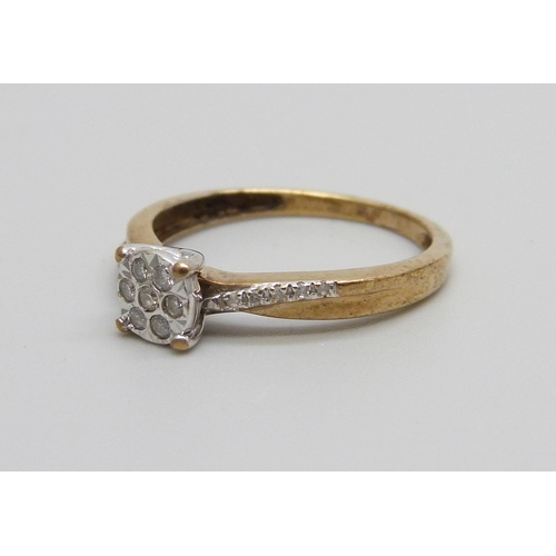 959 - A 9ct gold diamond cluster ring with diamond shoulders, 1.6g, L