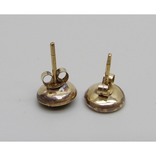 965 - A pair of 9ct gold, diamond and enamel ear studs, 1.1g