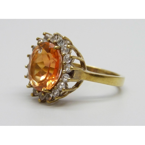 966 - A silver gilt tangerine topaz and zircon ring, R/S