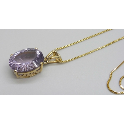 972 - A silver gilt amethyst pendant and chain