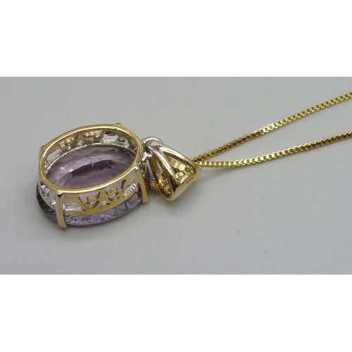 972 - A silver gilt amethyst pendant and chain