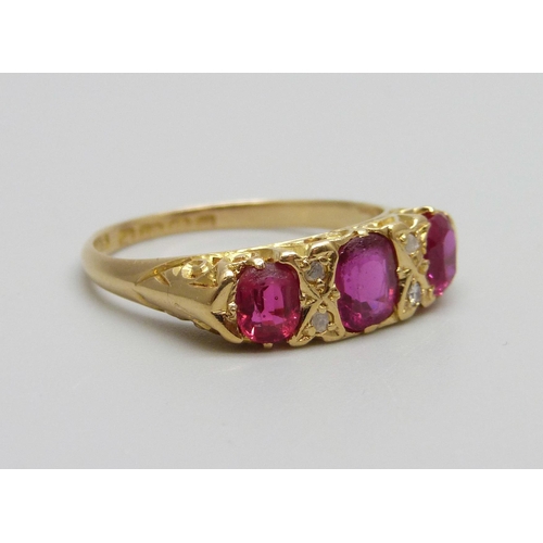 974 - An 18ct yellow gold diamond and pink stone ring, Birmingham 1912, 3.2g, O/P