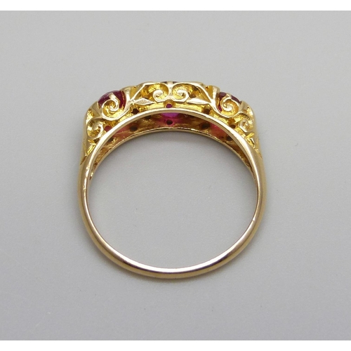 974 - An 18ct yellow gold diamond and pink stone ring, Birmingham 1912, 3.2g, O/P