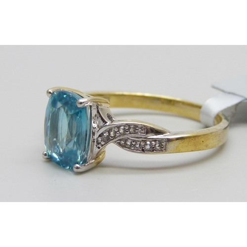 976 - A silver gilt topaz and zircon ring, S