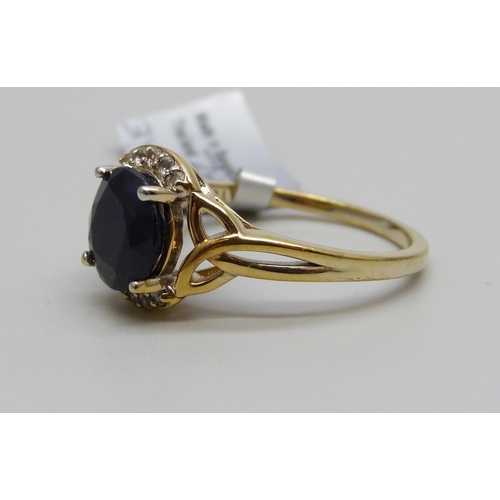 978 - A silver gilt sapphire and topaz ring, U