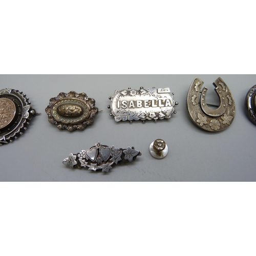 984 - Six brooches; three Victorian hallmarked silver, horseshoe, name brooch and small brooch with heart ... 