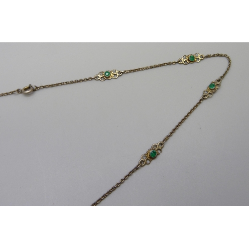 985 - A white metal, green stone and seed pearl necklace, continental mark on jump ring, 48cm