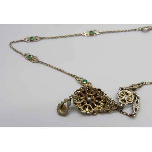 985 - A white metal, green stone and seed pearl necklace, continental mark on jump ring, 48cm