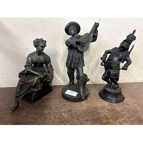 328 - Two continental bronze figures of musicians and one other