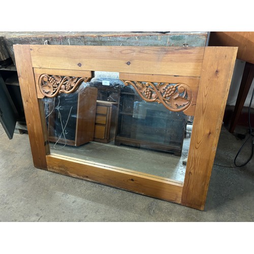 334 - A French style carved pine framed mirror