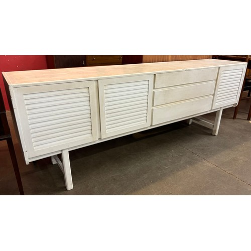 75 - A white painted McIntosh teak sideboard