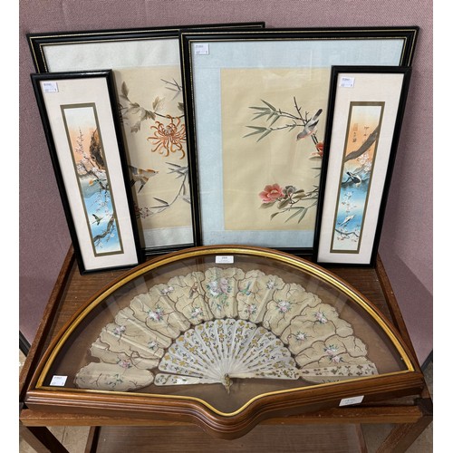 293 - An oriental mother of pearl and embroidered silk fan, a pair of Japanese prints and a pair of Japane... 