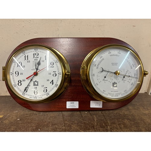 309 - A pair of brass cased Sewills weather dials, on mahogany plaque