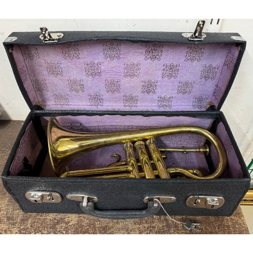 312 - A cased brass cornet