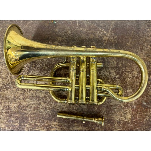 312 - A cased brass cornet