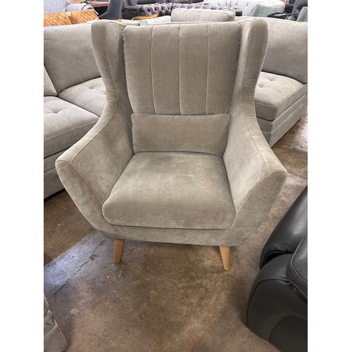 1407 - A grey upholstered Rosie armchair