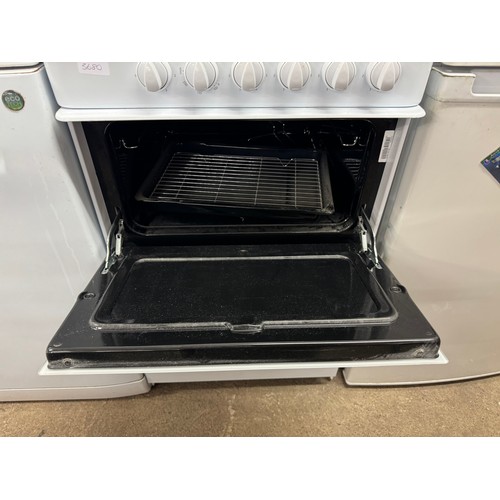 2108 - An Indesit KD-3CI(M)/G electric double oven oven and four station hob