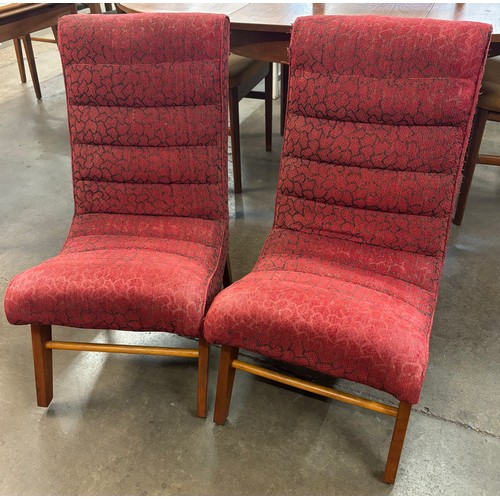 78A - A pair of teak and fabric upholstered fireside chairs