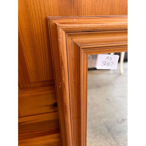 1476 - A pine framed mirror