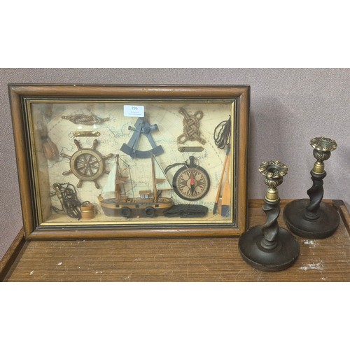 296 - A cased yachting diorama and a pair of oak barleytwist candlesticks