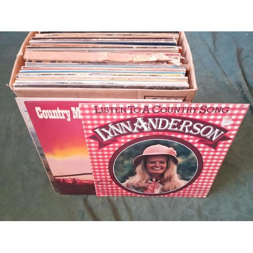 1083 - A box of over 45 film and TV LP records and over 50 country LP records **PLEASE NOTE THIS LOT IS NOT... 