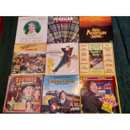 1083 - A box of over 45 film and TV LP records and over 50 country LP records **PLEASE NOTE THIS LOT IS NOT... 