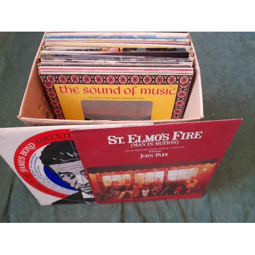 1083 - A box of over 45 film and TV LP records and over 50 country LP records **PLEASE NOTE THIS LOT IS NOT... 