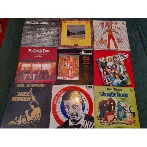 1083 - A box of over 45 film and TV LP records and over 50 country LP records **PLEASE NOTE THIS LOT IS NOT... 