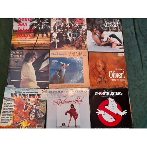 1083 - A box of over 45 film and TV LP records and over 50 country LP records **PLEASE NOTE THIS LOT IS NOT... 