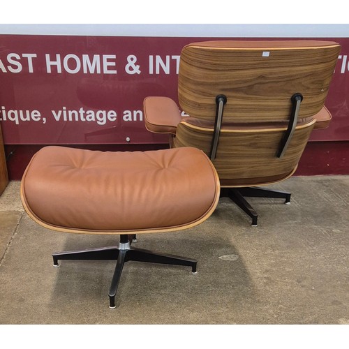 2 - A Charles & Ray Eames style simulated rosewood and tan leather upholstered revolving lounge chair an... 