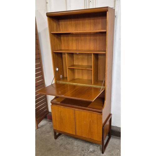 14 - A teak bookcase