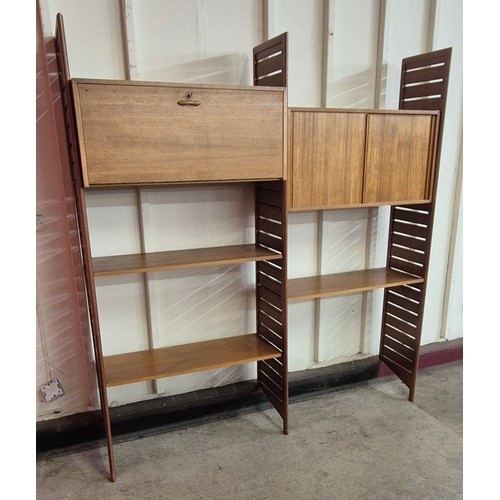 13 - A Staples teak Ladderax two bay room divider