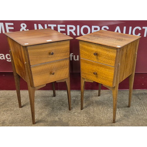 16 - A pair of walnut two drawer bedside tables