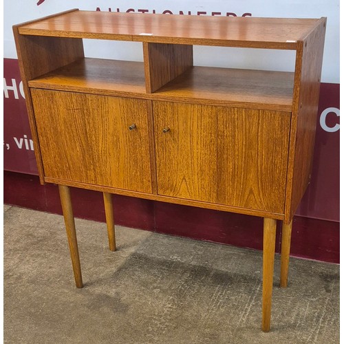 18 - A teak two door record cabinet