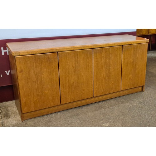 22 - A Danish Christian Linneberg teak four door sideboard