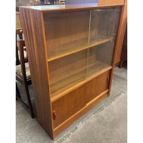 25 - A teak bookcase