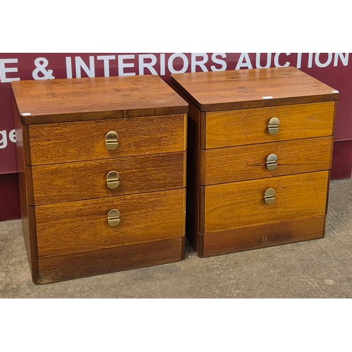 31 - A pair of Stag Cantata teak three drawer bedside chests, designed by John & Sylvia Reid