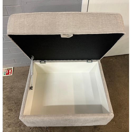 1368 - A grey upholstered storage footstool