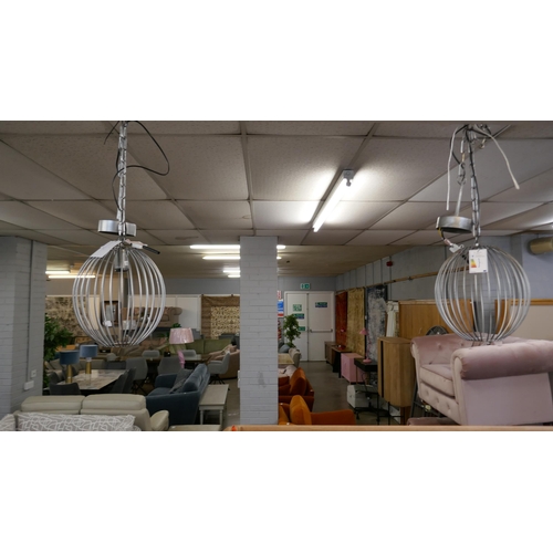 1410 - A pair of silver wire globe ceiling pendants